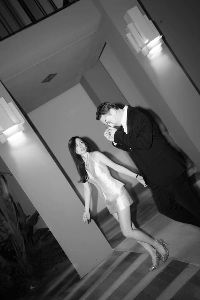 Black and white portrait of couple at Beverly Hills City Hall during an evening engagement photo session
